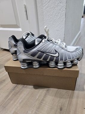 Nike Shox TL Sneakers in Silver and Black....
